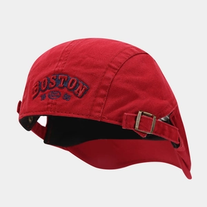 Detailed embroidery of 'BOSTON 1985' on red cotton canvas hat with metal buckle