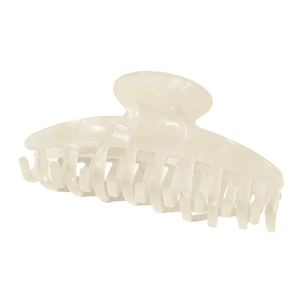 Detailed view of a cream-colored acetate hair claw clip with interlocking teeth for hair