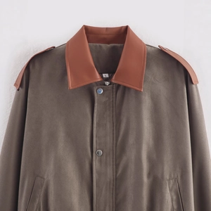 Fashionable brown color-block suede jacket with faux leather lapels and shoulder straps