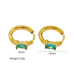Detail view of 15mm gold hoop earrings featuring 4mm rectangular teal zircon stones