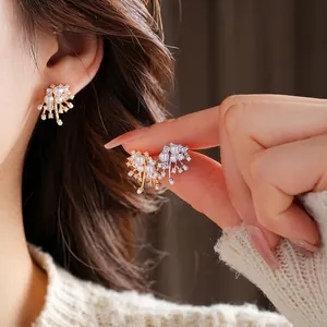 Elegant gold and silver firework pearl earrings with crystals for a luxury vintage look