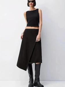 Minimalist black two-piece set featuring high-waist asymmetric midi skirt and sleeveless top