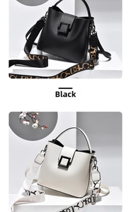 Detail of elegant litchi grain leather handbags with metal buckles and woven straps