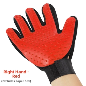 Close-up of red grooming glove with silicone massage nubs and black mesh fabric for pets