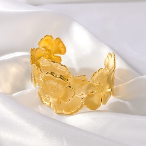 Exaggerated floral stainless steel open bangle with 18K gold plated layered petal design