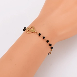 Bracelet à pendentif cœur doré avec perles noires facettées et icône religieuse