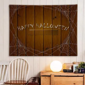 Detail of Halloween tapestry with wood texture, spider webs and Happy Halloween text