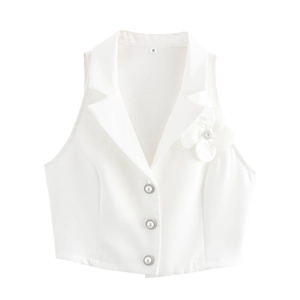 Elegant white sleeveless vest with 3D flower and pearl buttons on a flat background