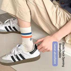 Striped cotton crew socks with smiley embroidery and high elastic ribbed cuffs