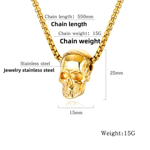 Detailed view of golden stainless steel skull pendant with 550mm chain specifications