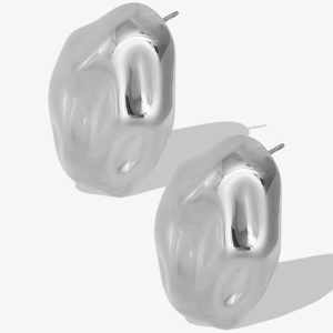 Detailed close-up of irregular 304 stainless steel earrings with a silver metallic finish