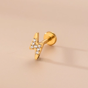 Golden lightning bolt 16G stainless steel labret stud with zircon stones on beige base