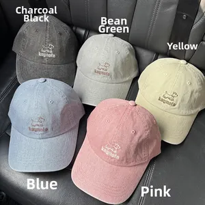 Collection of washed cotton baseball caps with dog embroidery in five soft colors