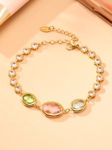 Detailed macro view of 18k gold plated bracelet with colorful Czech glass oval stones
