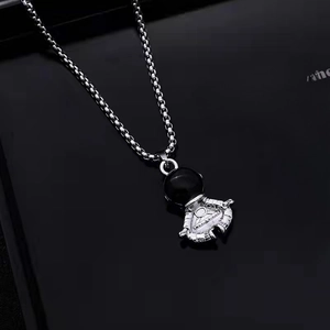 Astronaut necklace with silver box chain and polished black sphere pendant for couples