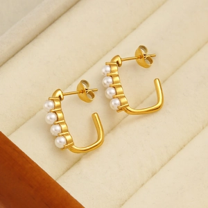 Classic 18K gold plated stainless steel J-hoop earrings featuring four white pearls