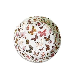 Overhead view of a white bucket hat featuring colorful butterfly prints and soft texture