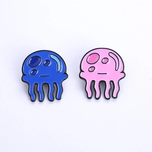 Cute cartoon jellyfish enamel pins set in blue and pink for backpacks and clothing