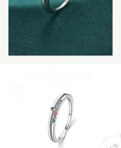 Close-up of S925 sterling silver double-line ring featuring multicolored gemstones