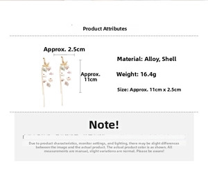 Detail view of long starfish and shell tassel earrings with size and weight specs