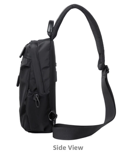 Side view of black nylon cross-body bag showing breathable mesh strap and side pocket