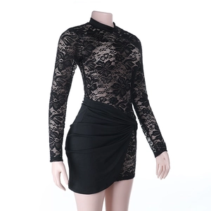 Detail of sheer black lace fabric and ruched bodycon design on a mini long-sleeve dress