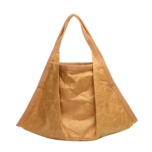 Brown Dupont paper tote bag with vintage crinkled texture and fabric handles