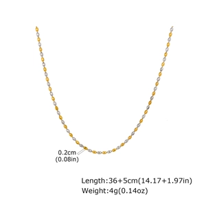 Detail showing 2mm gold and silver beads necklace length 36+5cm and 4g weight specs