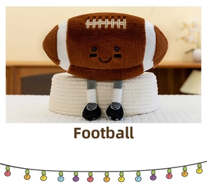 Detail of plush American football toy with long legs and embroidered face in basket