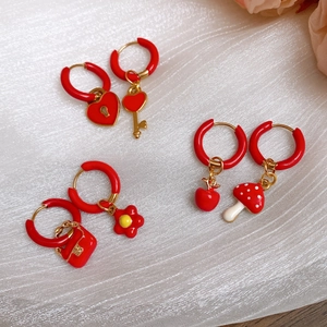 Asymmetric red enamel heart flower earrings set in gold stainless steel for women