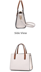 Detail of a beige tote bag showing side view with brown handles and gold-tone D-rings