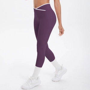 Pantalon de yoga violet à taille haute croisée avec liserés blancs contrastants