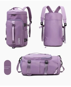 Detail view of taro purple waterproof nylon travel backpack with multiple zip compartments