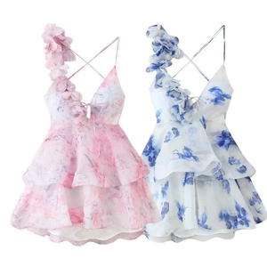 Floral mini sundresses in pink and blue with 3D flower petals and tiered skirts