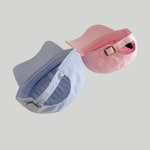 Pastel pink and purple cotton baseball caps with adjustable metal buckles for women