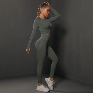 Detailed side view of olive green ribbed seamless yoga set with thumb holes and high waist