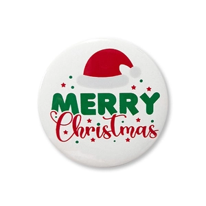 Detail of 58mm Merry Christmas tinplate badge with festive hat design and glossy finish