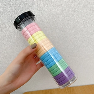 20-pack seamless elastic hair ties in pastel macaron colors with transparent storage jar