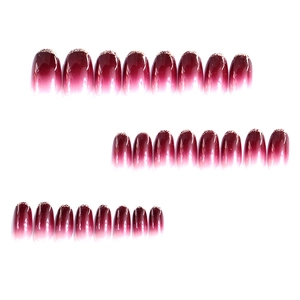 French gradient press-on nails with wine red to white fade and gold glitter finish