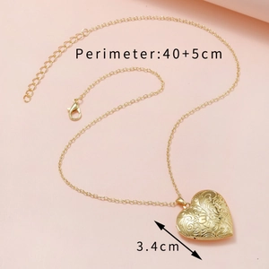 Golden heart-shaped locket necklace with floral engraving and 40+5cm chain size details