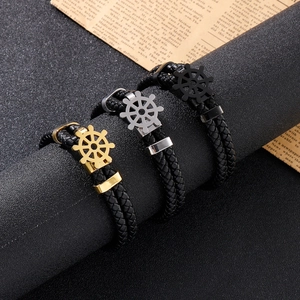Men's double-layer braided leather anchor bracelet set in black, gold, and silver finishes
