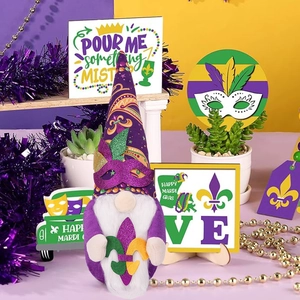 Detail of Mardi Gras gnome with purple mask and colorful festive party decorations