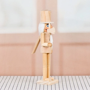 Front view of a 38cm unfinished natural wood nutcracker soldier with a white beard