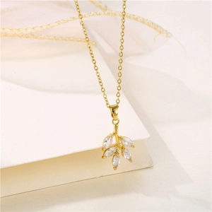 Elegant 18K gold-plated leaf pendant necklace featuring sparkling micro-pave crystals