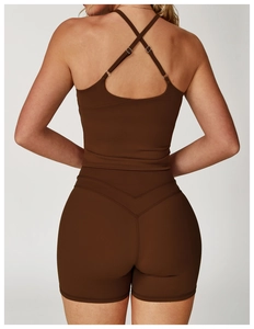 Rear view of cross-back yoga vest and high-waisted shorts in chocolate brown