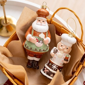 Christmas ginger-colored Santa Claus and chef figurines hanging in a rustic basket
