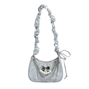 Silver metallic pleated crescent shoulder bag with pearl chain and bow detail