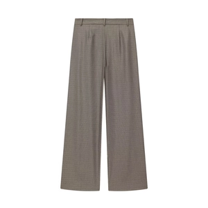 Detail of taupe wide-leg suit trousers showing high-quality twill fabric texture