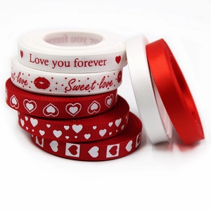 Rolls of red and white 9mm ribbons with Love you forever and heart patterns