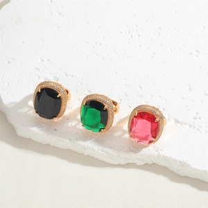 Three 14K gold plated geometric rings with black, green, and pink zircon stones
